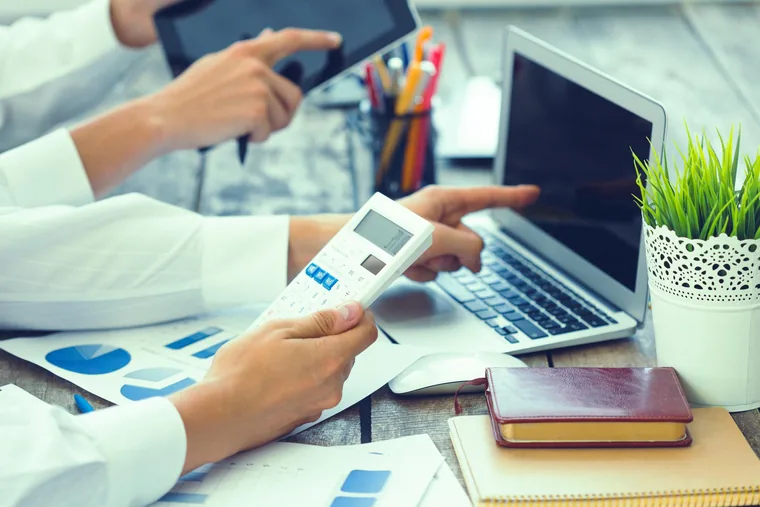 Payroll processing and compliance paperwork